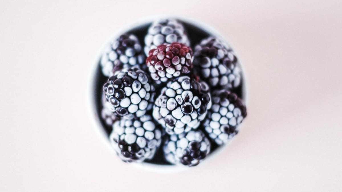 healthy frozen blackberries in a bowl