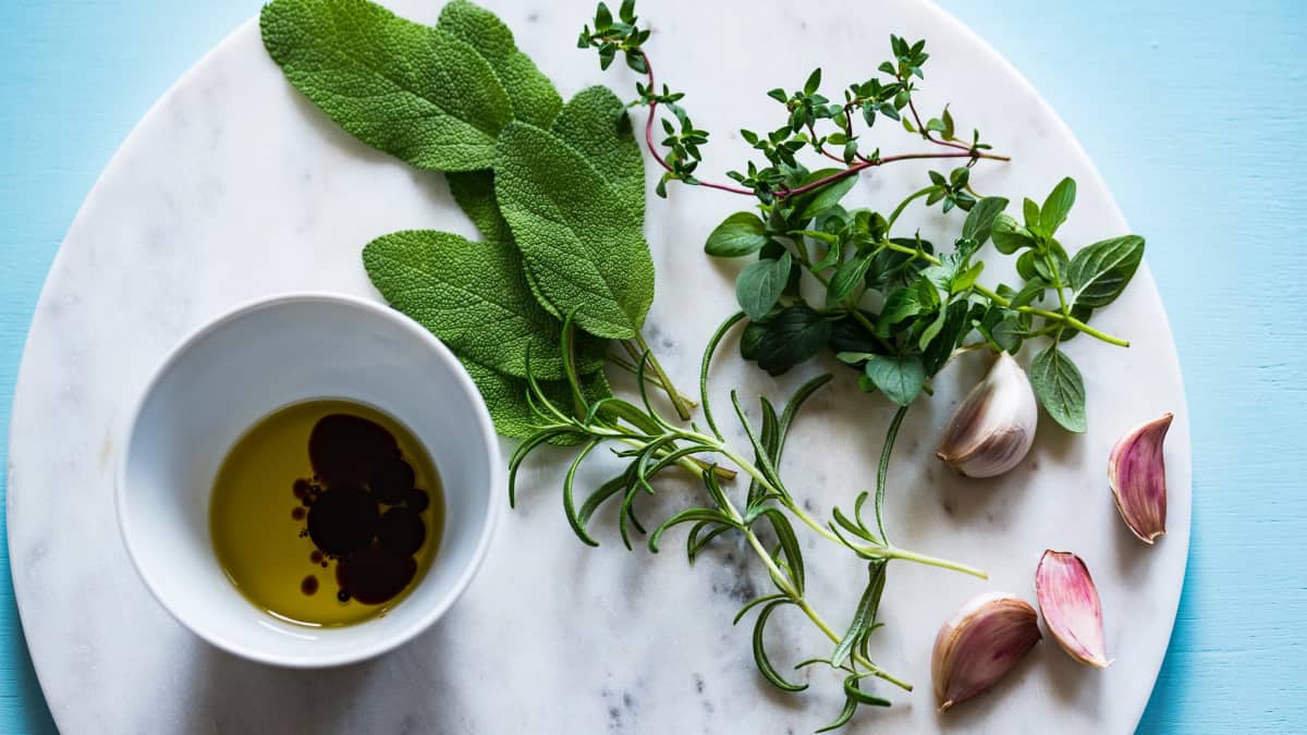 herbs, spices, oil on platter for salt alternative