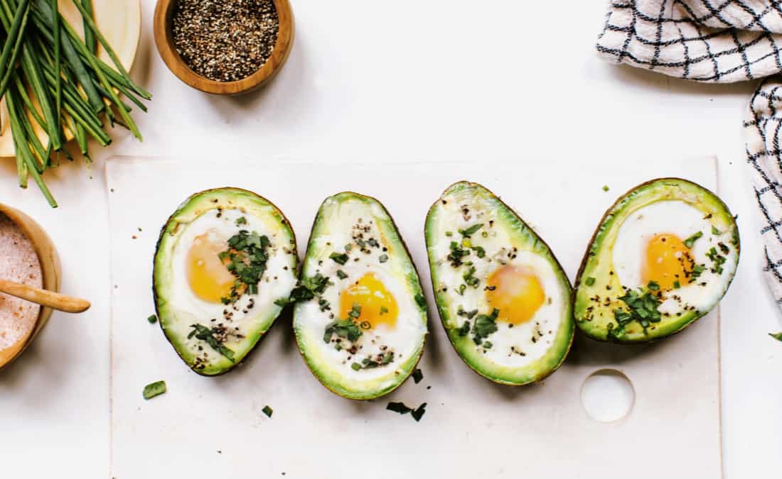 Baked Avocado Egg Boats with Fresh Herbs