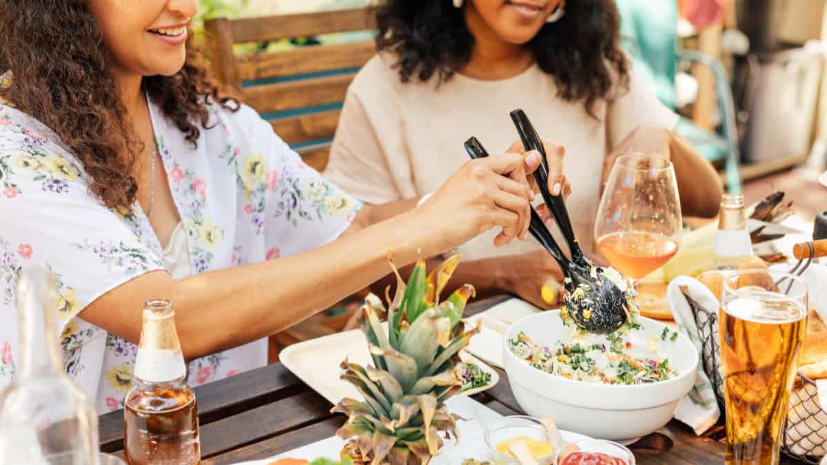 black women enjoying a refreshing dinner on a hot summer night