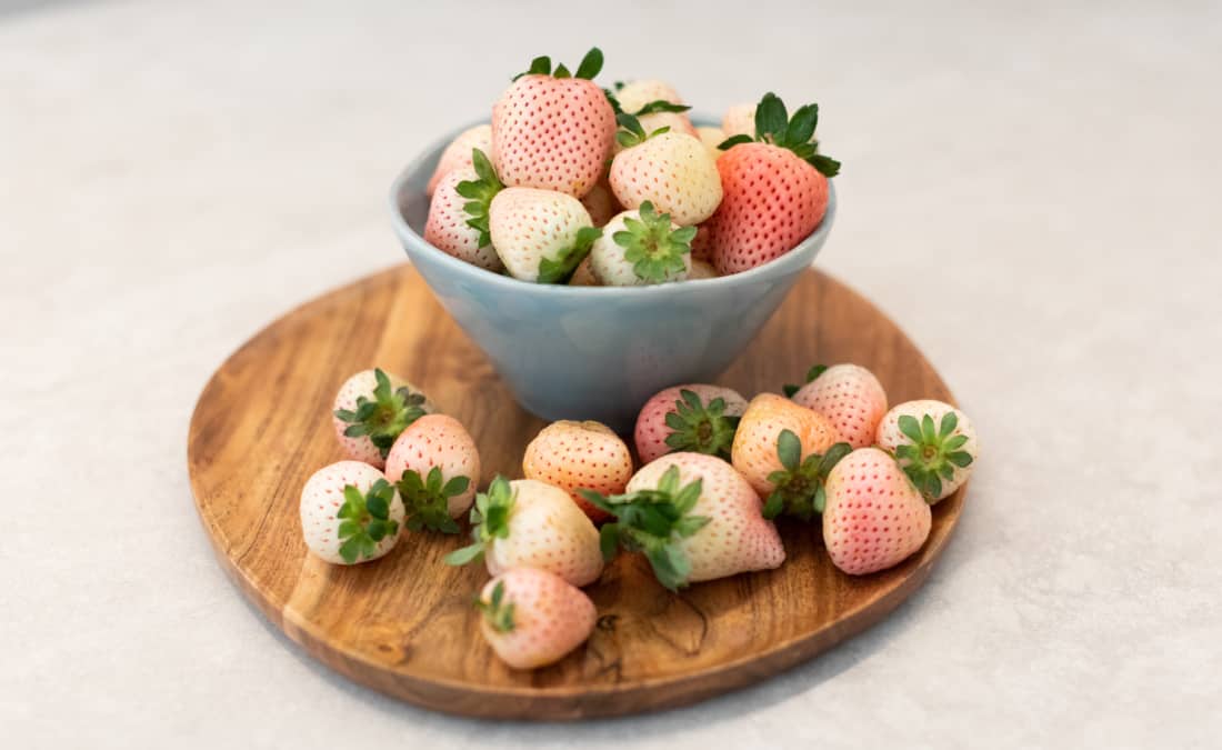 pineberries in bowl and on counter