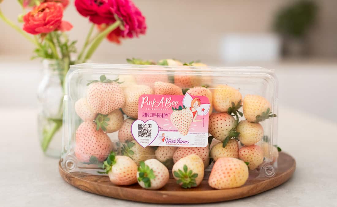 pink-a-boo pineberries container on kitchen counter