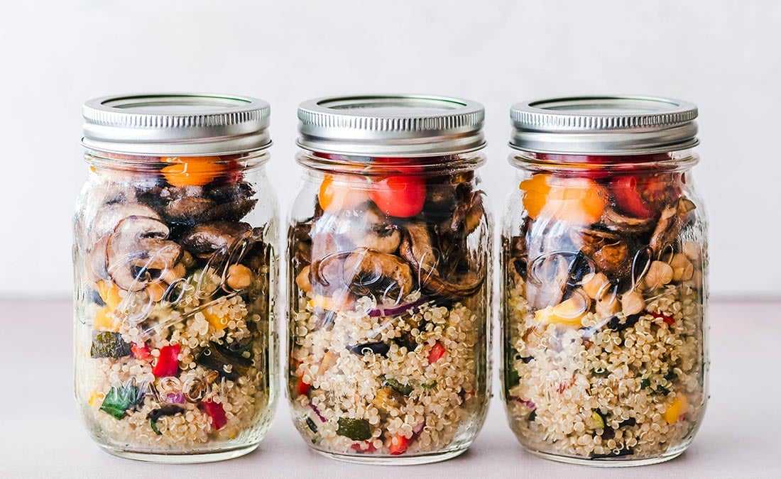 jars of quinoa and veggies for gut health