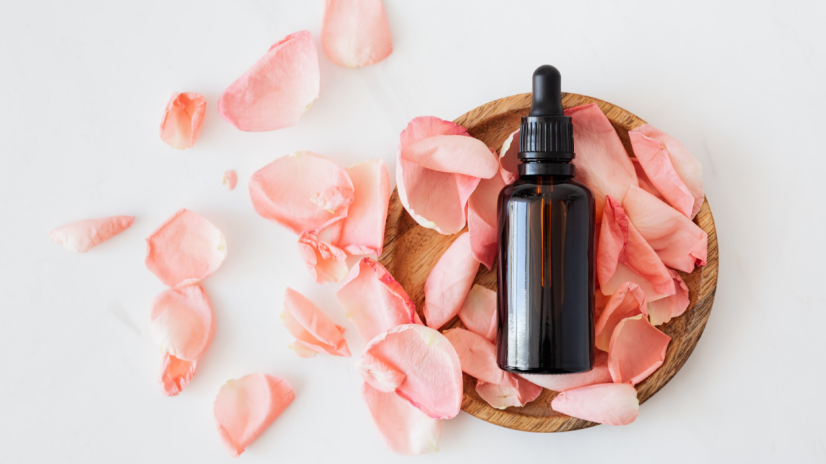 essential oils for focus energy stress and mood with rose petals